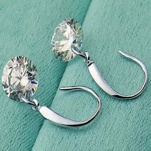 Diamond in the Sky - Drilled Naked Crystal DiamDrilled Naked Crystal Diamond on a Sterling Silver Hook Earringsond on a Sterling Silver hook earrings